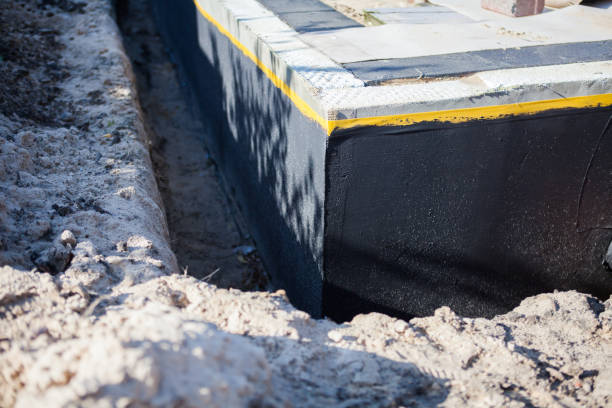 Professional Waterproofing technician working in Hawthorne, NY